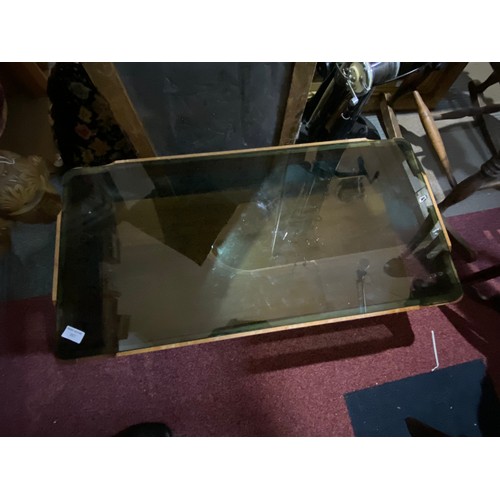 387 - Mid century glass top teak coffee table measuring 88 x 44 x 36 cms tall