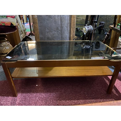 387 - Mid century glass top teak coffee table measuring 88 x 44 x 36 cms tall