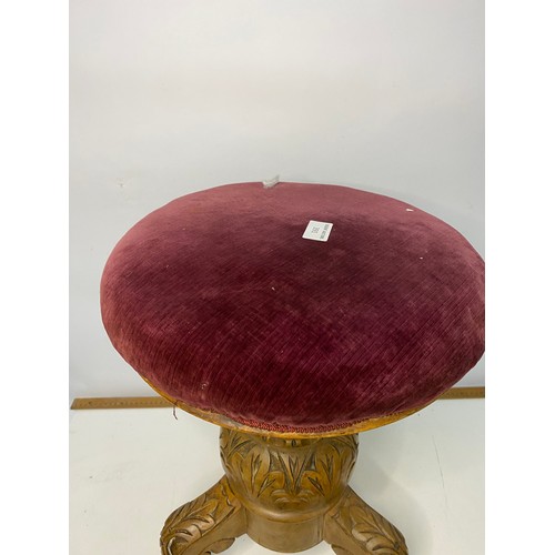 391 - Rise and Fall piano stool on central pedestal with padded seat.