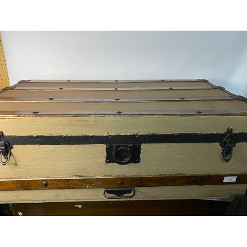 400 - Metal trunk with wooden bands on lid measuring 91 x 48 x 31 cms tall