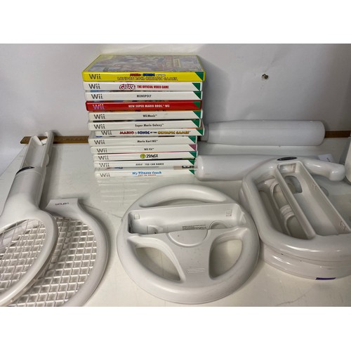 410 - Nintendo Wii console and Wii Fit, Sports Bundle, MarioKart, lots of accessories and 12 games. Small ... 