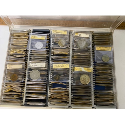 434 - A case of over 150 collectable coins from Canada, China, Chile, Cuba, Cyprus, Czech