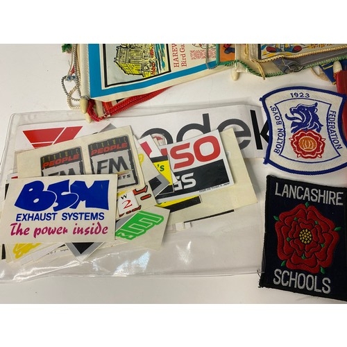 43 - Large collection of pennants, badges and stickers.