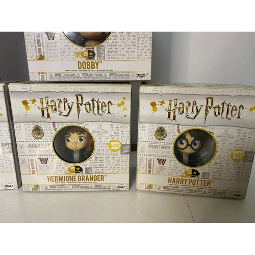 454 - Selection of 7 Harry Potter figures from Funko, includes Dobby, Ron Weasley, Dumbledore, Hermione, H... 