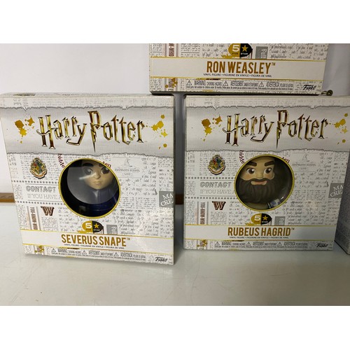 454 - Selection of 7 Harry Potter figures from Funko, includes Dobby, Ron Weasley, Dumbledore, Hermione, H... 