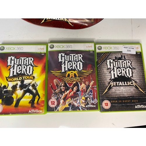 300 - X-Box 360 Guitar Hero bundle comprising of Metallica guitar and 3 games.