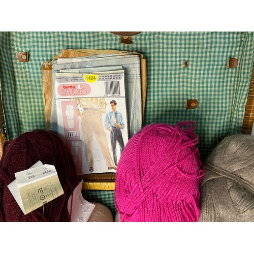 632 - Selection of knitting wool and accessories in wicker basket