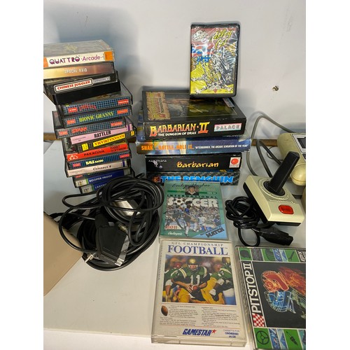 633 - A vintage Commodore 64 with selection of games and monitor