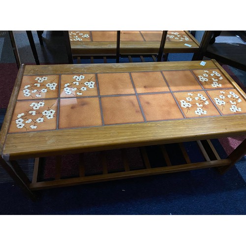 644 - Tile top retro coffee table measuring 95 x 47 x 40 cms tall