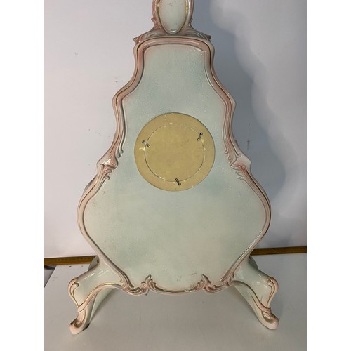 648 - Large ornate porcelain table clock measuring 63 cms tall