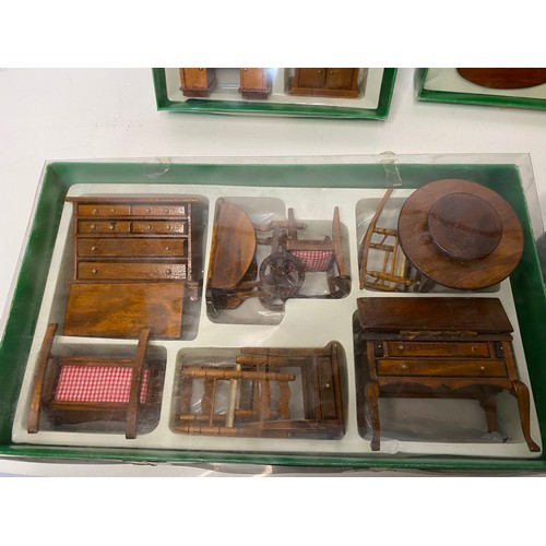 675 - Box of vintage wooden dolls house furniture most in original boxes.