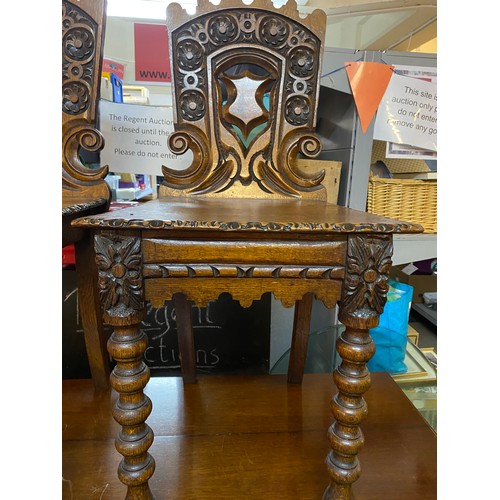 754 - Pair of ornate hall chairs