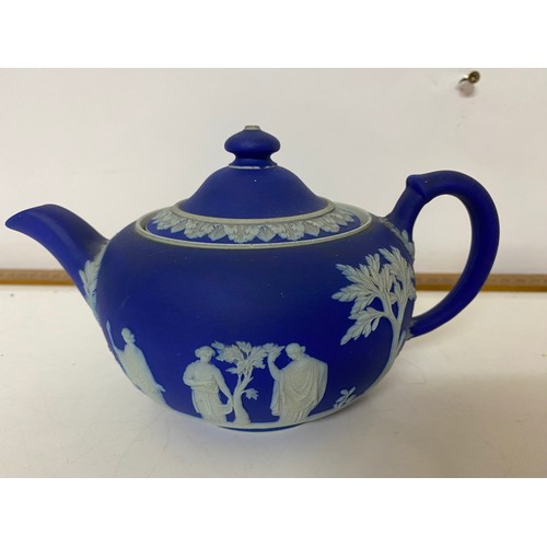 772 - Black Wedgwood table lighter and dark blue Wedgwood teapot, slight chip to rim