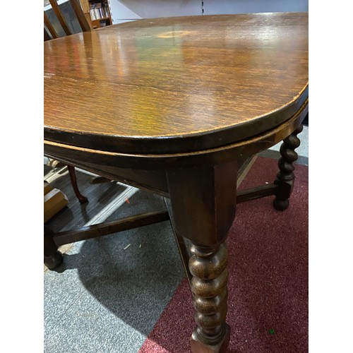 781 - Oak extending table with barley twist legs, top  measures 93x102cms and 76cms high