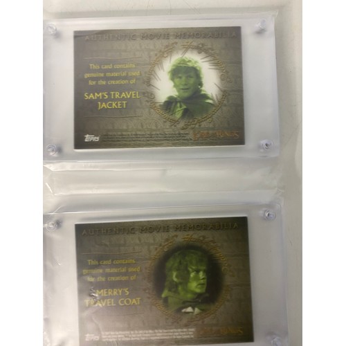 808 - Topps Lord of the Rings, two authentic movie memorabilia costume cards in archival safe card holder ... 