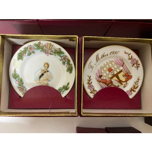 769 - Boxed selection of 12 x Caverswall miniature cups and saucers depicting Christmas and Easter event, ... 