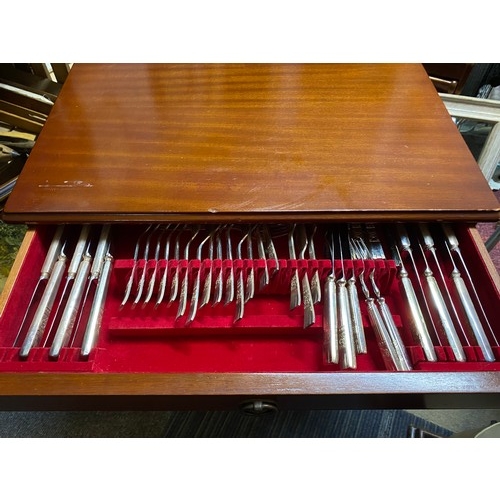 779 - Silver plate cutlery set in a 3 drawer display unit standing 59 x 72cms tall