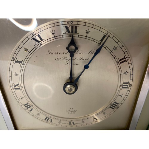 713 - An Elliot clock from Gerrard & Co Ltd in marble and chrome. Has been over wound.