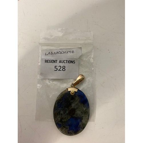 528 - Stunning labradorite in yellow metal mount