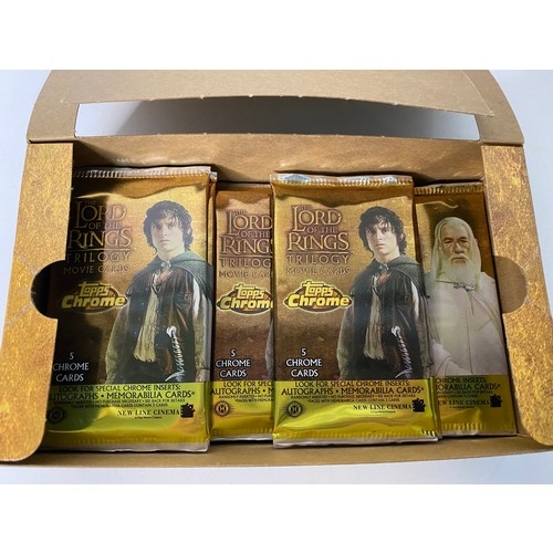 804 - Topps The Lord of the Rings Trilogy Chrome Cards, 14 sealed packets boxed and made in 2004.