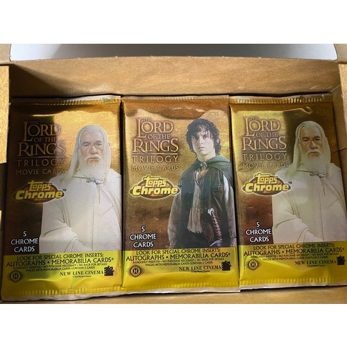 804 - Topps The Lord of the Rings Trilogy Chrome Cards, 14 sealed packets boxed and made in 2004.