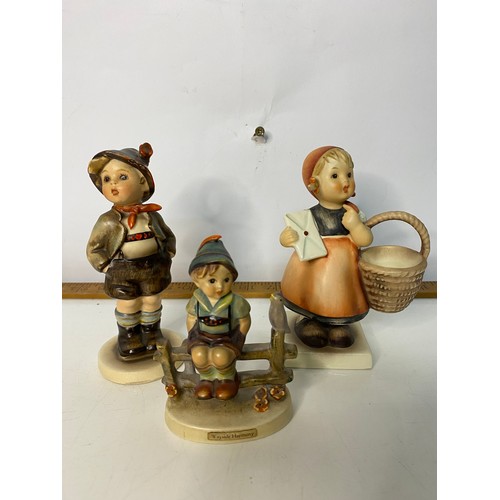 109 - A Victorian Bisque spill holder/planter and 3 x Goebel figures. 24x17cms