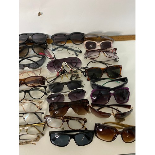 115 - Selection of glasses and sunglasses.