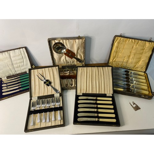 493 - 5 boxed complete Art Deco antique cutlery sets.