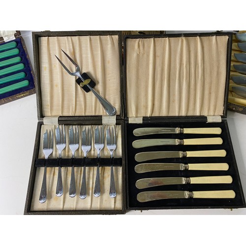 493 - 5 boxed complete Art Deco antique cutlery sets.