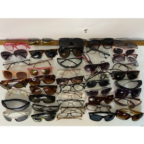 115 - Selection of glasses and sunglasses.