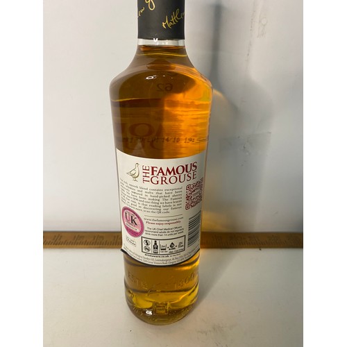 62 - 700ml bottle of Famous Grouse blended Scotch Whiskey.