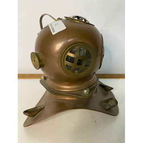 71 - Miniature brass and copper divers helmet. 16cms