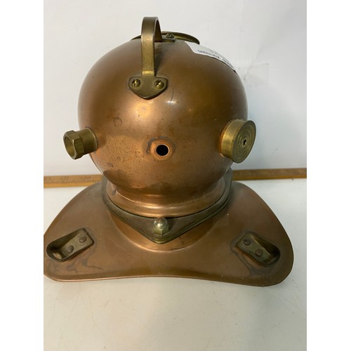 71 - Miniature brass and copper divers helmet. 16cms