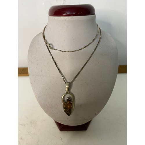 93 - Sterling Silver and Amber necklace.