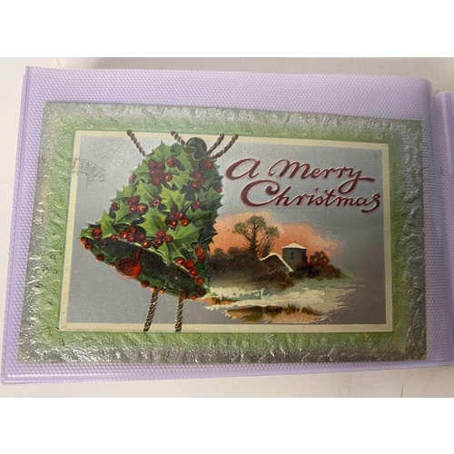 35 - Postcard album of greetings postcards and bundle of greetings cards.