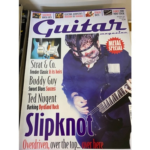 87 - Large collection of Learn to Play The Guitar magazines and DVD's.