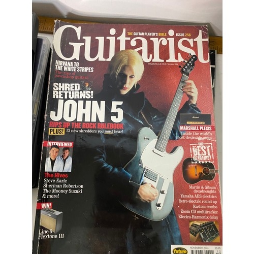 87 - Large collection of Learn to Play The Guitar magazines and DVD's.