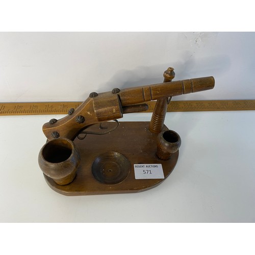 571 - Antique wooden pipe rack in pistol design