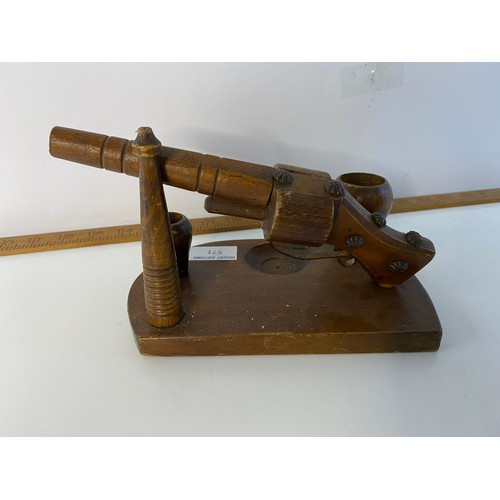 571 - Antique wooden pipe rack in pistol design