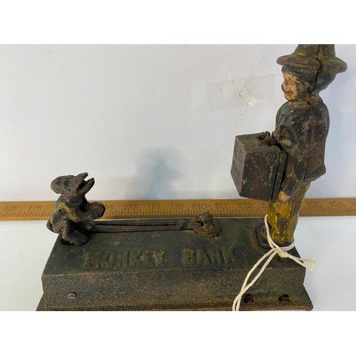 575 - Antique cast iron mechanical moneybox, Jumping 