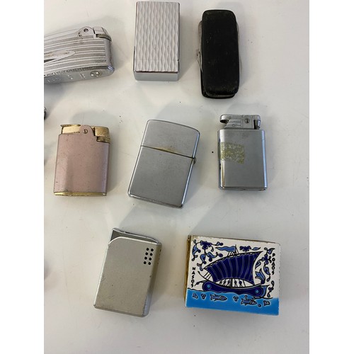 586 - Selection of tobacciana including lighters, matchbox holder and penknives.