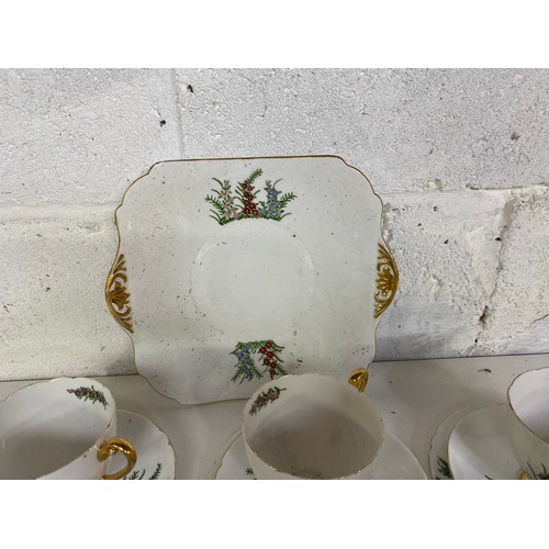 728 - Shelley teaset comprising 6 trios and a cake plate