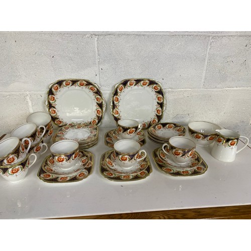 741 - Collection of Wellington China including 2 x cake stands, 11 x trios and milk and sugar bowl