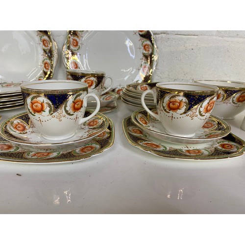 741 - Collection of Wellington China including 2 x cake stands, 11 x trios and milk and sugar bowl