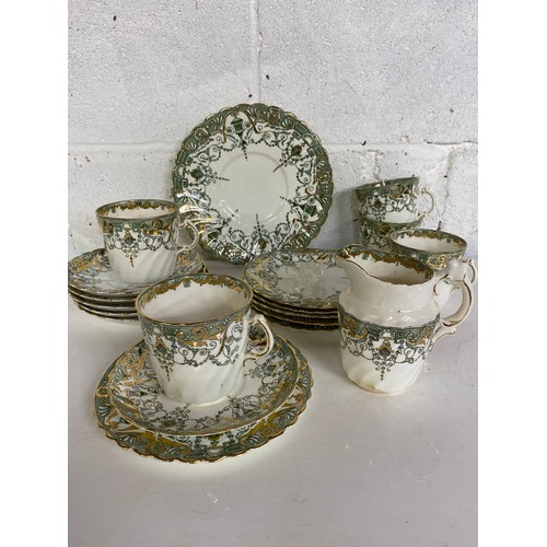 756 - Rena teaset no.123030 in green and gold comprising a cake plate, 5 x trio's and a milk jug