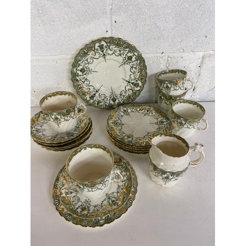 756 - Rena teaset no.123030 in green and gold comprising a cake plate, 5 x trio's and a milk jug