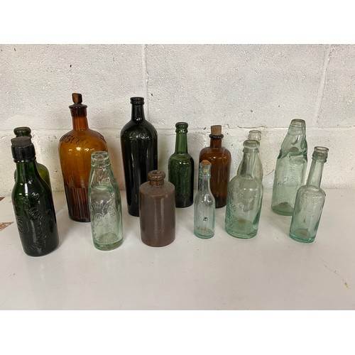 759 - Selection of antique green and brown glass bottles