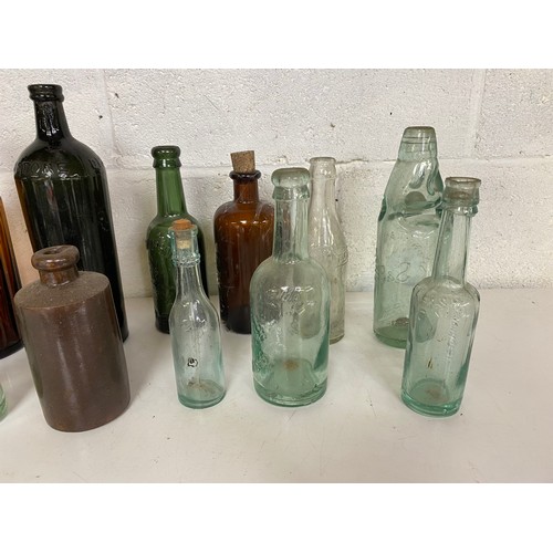 759 - Selection of antique green and brown glass bottles