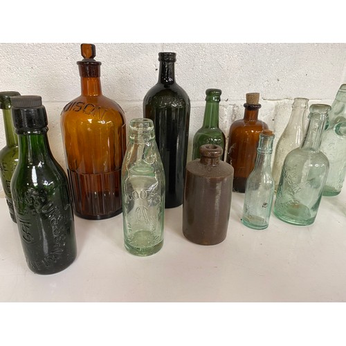 759 - Selection of antique green and brown glass bottles