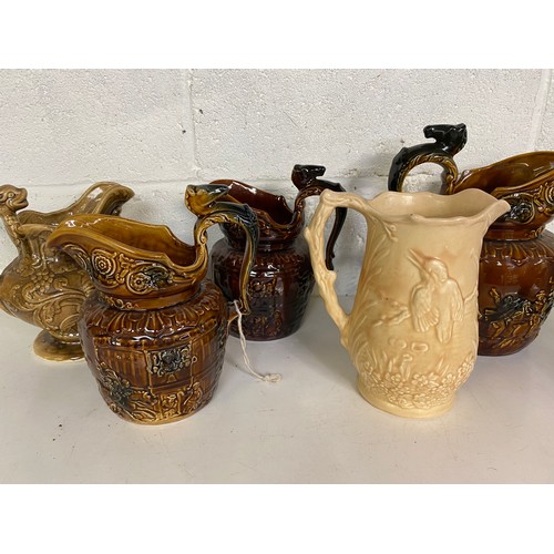 779 - Collection of 7 x water jugs, mainly Arthur Wood